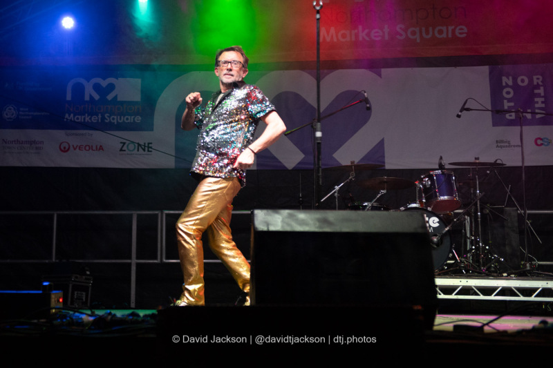 Bernie Keith’s Handbag Heaven on stage at the Market Square in Northampton on Saturday, October 19, 2024, performing as part of a weekend of activities celebrating its official reopening. Photo by David Jackson.