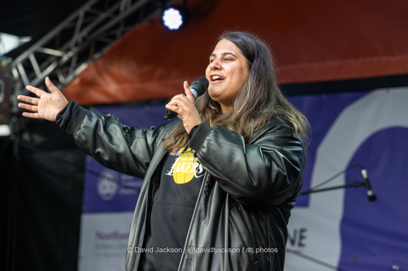 BBC Introducing’s Kerrie Cosh introducing acts on stage at the Market Square in Northampton on Saturday, October 19, 2024, as part of a weekend of activities celebrating its official reopening. Photo by David Jackson.