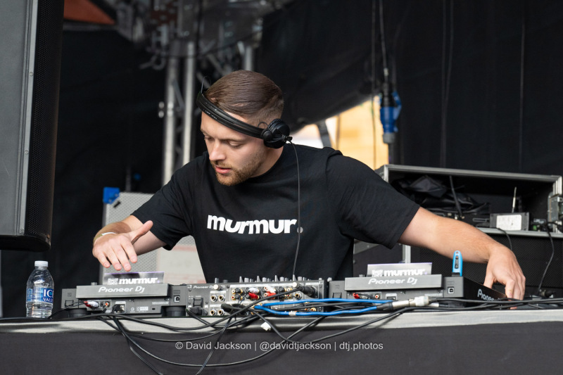 DJ AON on stage at the Market Square in Northampton on Saturday, October 19, 2024, performing as part of a weekend of activities celebrating its official reopening. Photo by David Jackson.