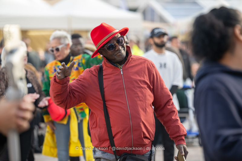 People enjoying acts performing on stage at the Market Square in Northampton on Saturday, October 19, 2024, as part of a weekend of activities celebrating its official reopening. Photo by David Jackson.