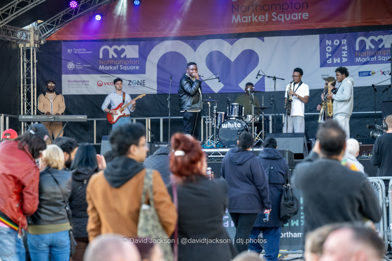 Great Adamz on stage at the Market Square in Northampton on Saturday, October 19, 2024, performing as part of a weekend of activities celebrating its official reopening. Photo by David Jackson.