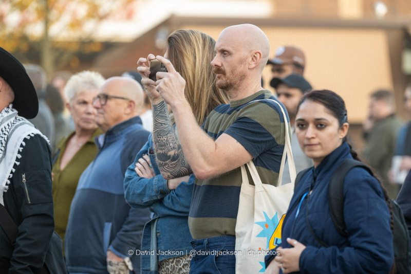 People enjoying acts performing on stage at the Market Square in Northampton on Saturday, October 19, 2024, as part of a weekend of activities celebrating its official reopening. Photo by David Jackson.