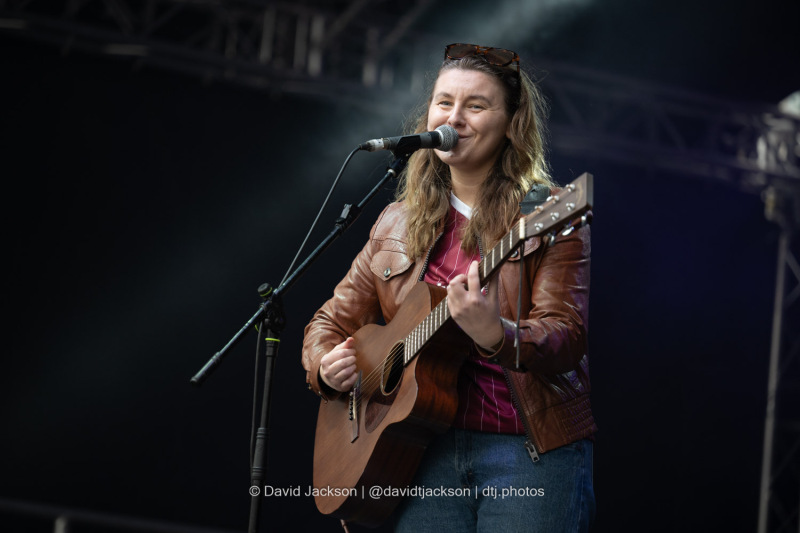 Hana Brooks on stage at the Market Square in Northampton on Sunday, October 20, 2024, performing as part of a weekend of activities celebrating its official reopening. Photo by David Jackson.