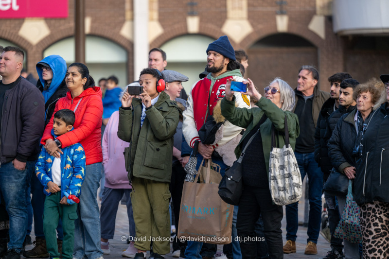 Crowds watching acts perform at the Market Square in Northampton on Sunday, October 20, 2024, as part of a weekend of activities celebrating its official reopening. Photo by David Jackson.
