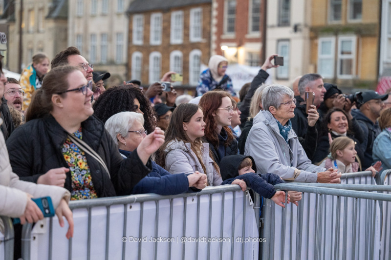 Crowds watching acts perform at the Market Square in Northampton on Sunday, October 20, 2024, as part of a weekend of activities celebrating its official reopening. Photo by David Jackson.