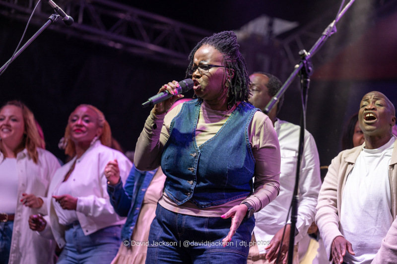 The Northants Sings Out Choir on stage at the Market Square in Northampton on Sunday, October 20, 2024, performing as part of a weekend of activities celebrating its official reopening. Photo by David Jackson.