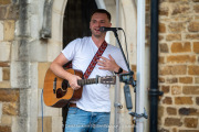 Joe Corkram performing on the Acoustic Stage at the Northampton Music Festival on Sunday, September 7, 2025. Photo by David Jackson.