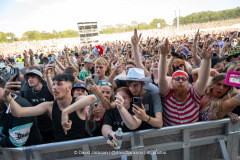 Fans watching acts perform at Tribes Unite at The National Bowl in Milton Keynes on Saturday, August 9, 2025. Photo by David Jackson.
